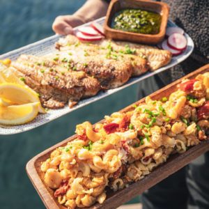 plated fish and mac n cheese