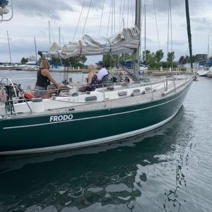 Frodo Sloop Monohull sailboat leaving the Thunder Bay Marina